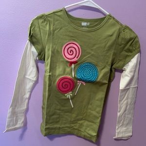 Green and white long sleeve T-shirt with lollipops